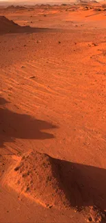 Red Martian desert landscape wallpaper with rocky terrain.