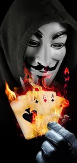 Masked figure holds fiery aces in dark, artistic mobile wallpaper.