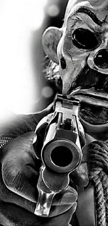 Black and white image of person wearing mask with gun.