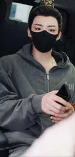 Mysterious man in dark hoodie with mask.