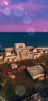 Mayan ruins with beach sunset in background.