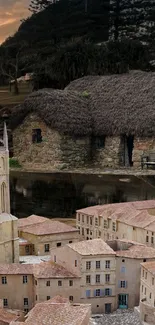 A medieval cityscape with a church tower and rustic stone buildings.