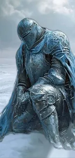 A medieval knight kneels in a snowy landscape, clad in blue-tinted armor.