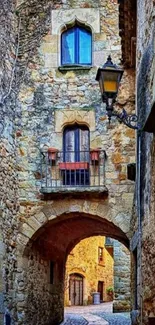 Medieval stone alleyway with rustic architecture and vibrant colors.