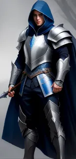 Hooded warrior in blue armor holding a spear with a mystical fog background.