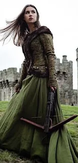 Medieval warrior princess in green dress with castle background.