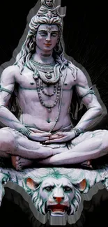 Lord Shiva meditating statue with a serene and spiritual ambiance.