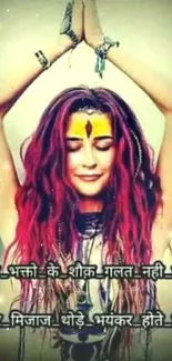 Serene woman in meditation with vibrant henna and colorful hair.