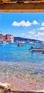 Mediterranean coastal view with boats and blue waters.