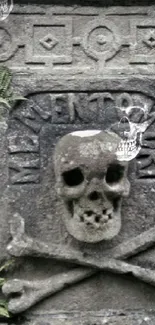 Memento mori skull stone engraving with crossbones.