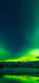 Aurora Borealis over snowy landscape with vivid green and blue hues.