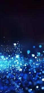 Mesmerizing blue bokeh wallpaper with glowing light dots.