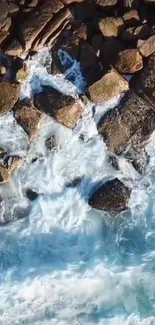 Aerial view of ocean waves crashing against rocks.