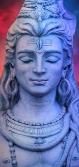 Serene Lord Shiva statue with colorful sky.