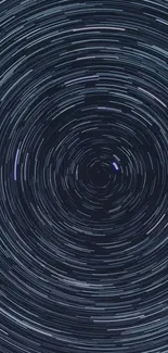 Dark blue star trail pattern creating circular mesmerizing effect.