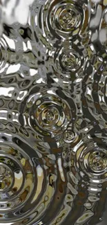 Close-up of abstract metallic ripple pattern wallpaper.