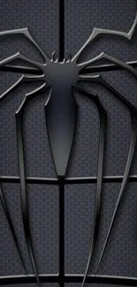 Metallic spider symbol on dark wallpaper.