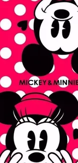 Mickey and Minnie on pink polka dot background