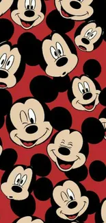 Cartoon Mickey Mouse faces on a red background.