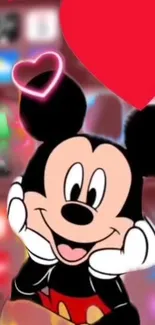 Mickey Mouse with a glowing heart background on mobile wallpaper.