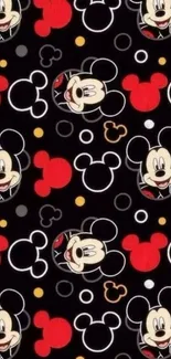 Mickey Mouse pattern on black wallpaper.