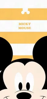 Mickey Mouse wallpaper with yellow stripes.