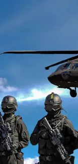 Four soldiers in combat gear with a helicopter, set against a blue sky.
