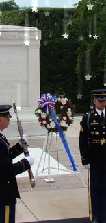 Military honor guard at memorial ceremony with wreath.