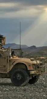 Military vehicle in desert with sun rays.