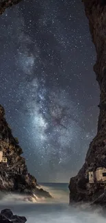 Milky Way above rocky cavern entrance at night.