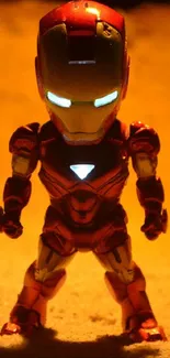 Miniature hero figure stands in a glowing desert setting.