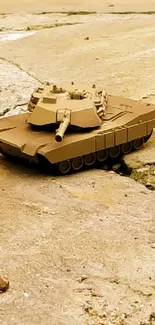 Realistic miniature tank on pavement background.