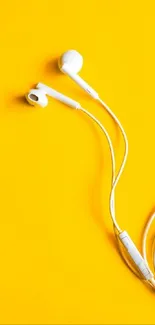 Minimalistic white earphones on a vibrant yellow background, perfect for tech wallpaper.