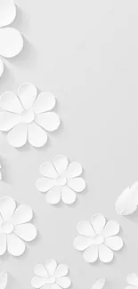 Minimalist white paper flowers on a light gray background creating a serene mobile wallpaper.