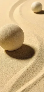 Minimalist wallpaper with sand spheres and smooth curves for a calming Zen effect.