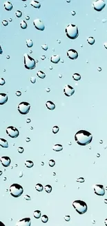 Water droplets on a light blue background, creating a calming effect.