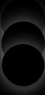 Minimalist black circles mobile wallpaper with dark theme aesthetic.