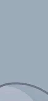 Minimalist light blue wallpaper with curved design.