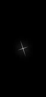 Minimalist wallpaper with glowing cross on black background.