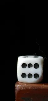 Minimalist white dice on wooden edge wallpaper.