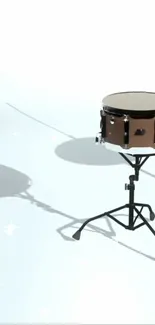 Minimalist drum set on white background with artistic shadows.