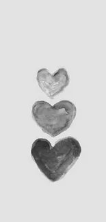 Grayscale watercolor hearts on minimalist background.