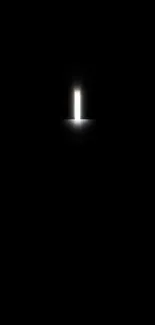 Minimalist dark wallpaper with glowing light portal.