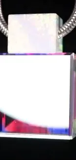 Minimalist crystal necklace on a black background.