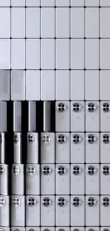 Stacked gray smartphones in minimalist design.