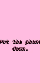 Minimalist pink wallpaper with 'Put the phone down' text.