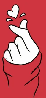 Minimalist wallpaper with a love hand gesture on red background.