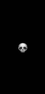 Minimalist skull on a black background wallpaper.