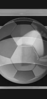 Monochrome black and white soccer ball design with a geometric pattern.