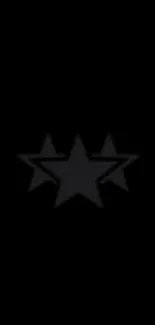 Minimalist black wallpaper with three star design.